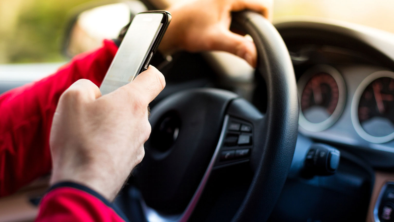 What should I do if I was hit by a driver who was texting?